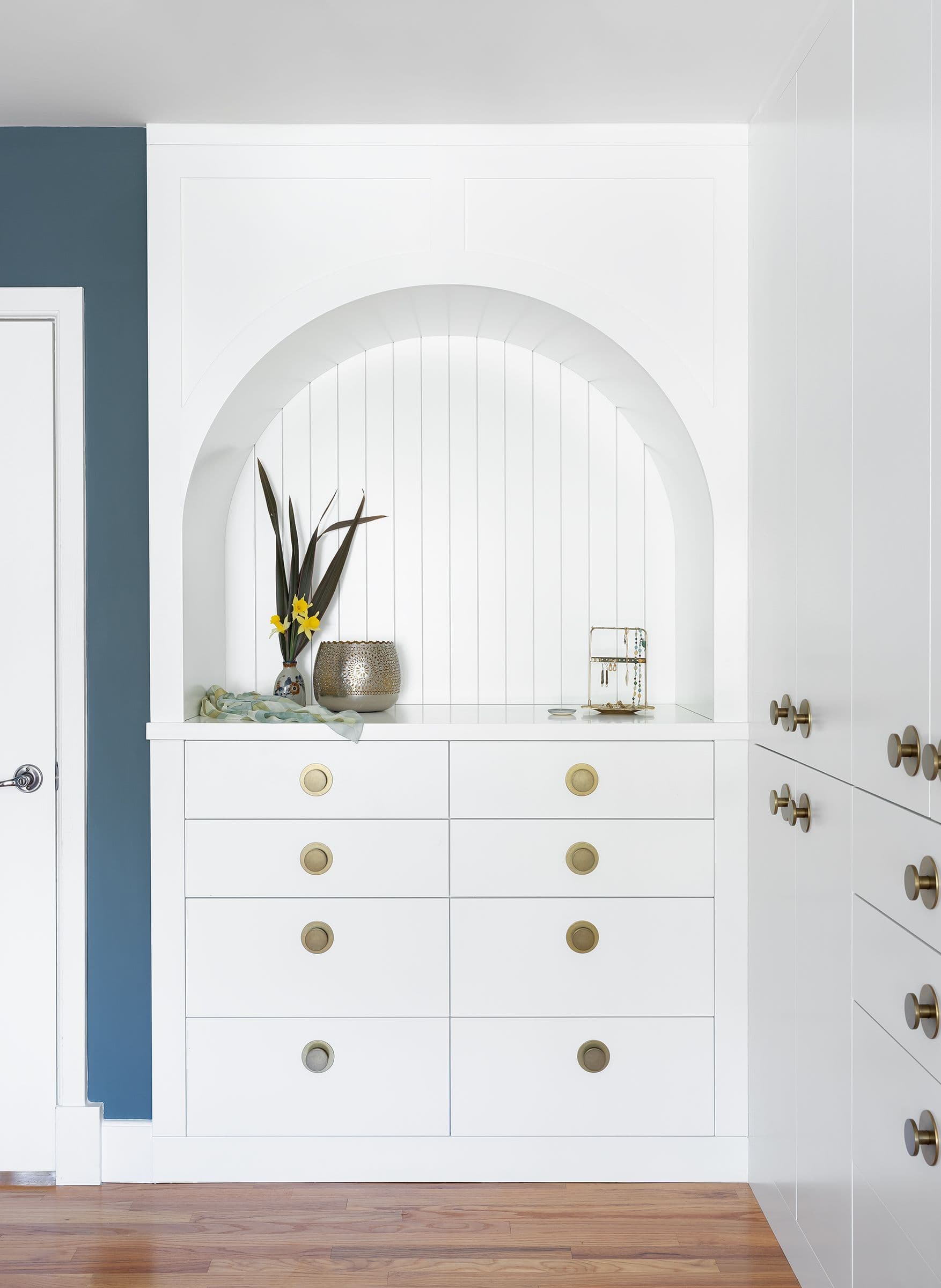 Arched dresser niche with brass pulls, the Blue Mudroom