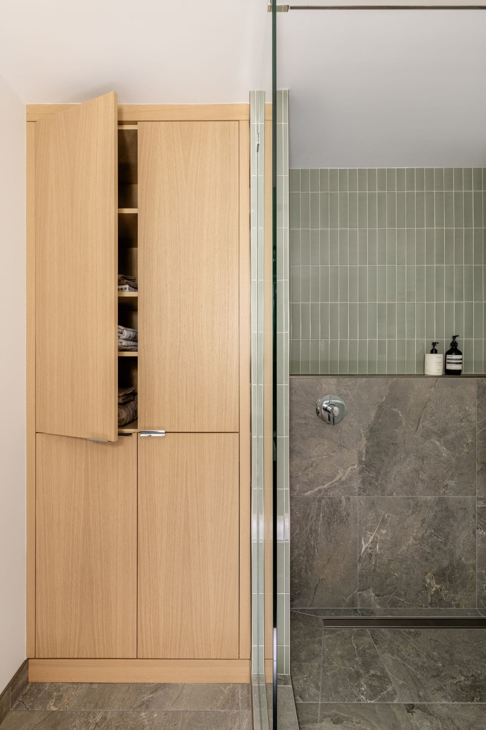 White-oak linen tower beside the shower, the White-Oak Home