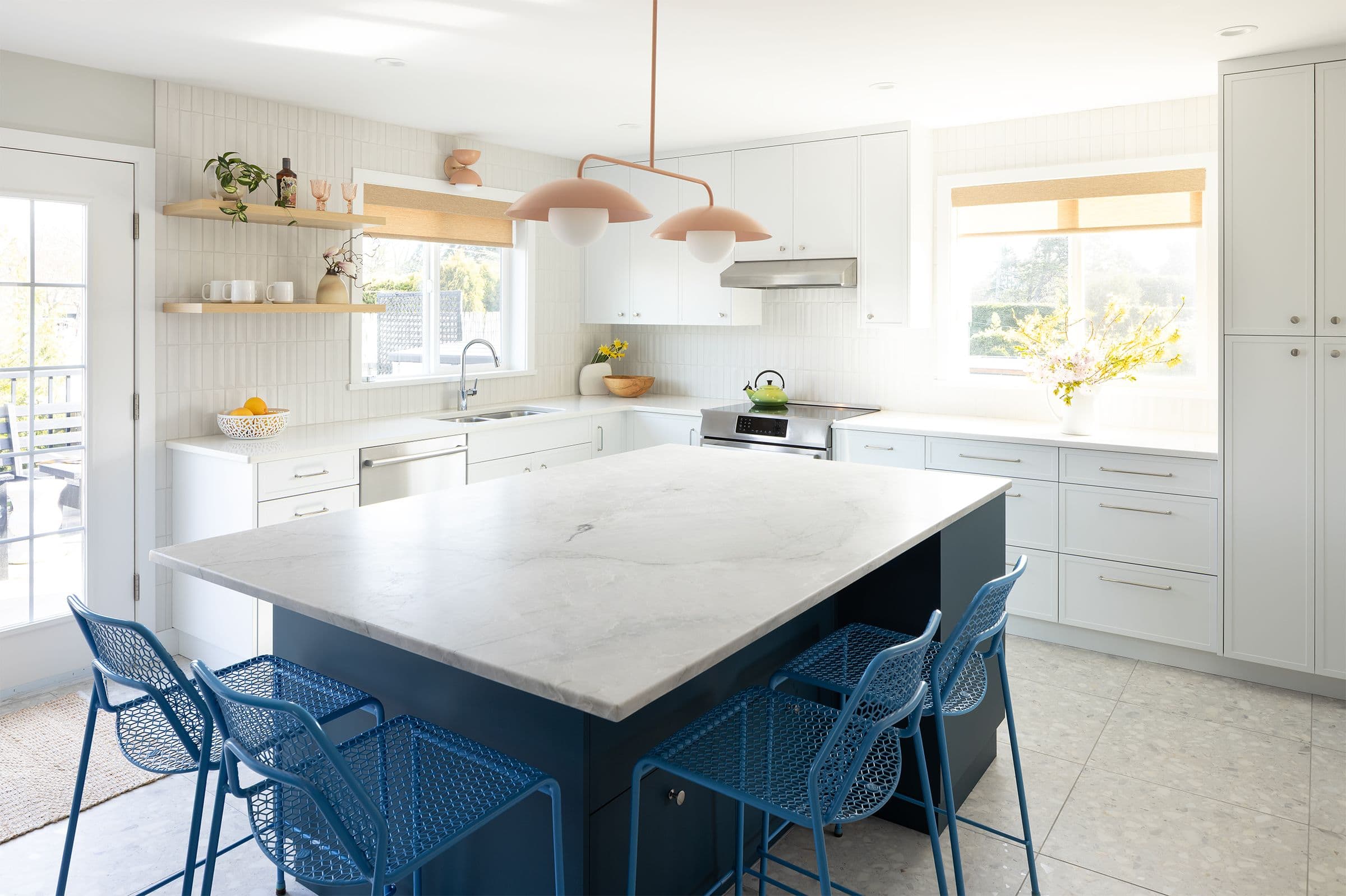 White kitchen with navy island, Thompson residence
